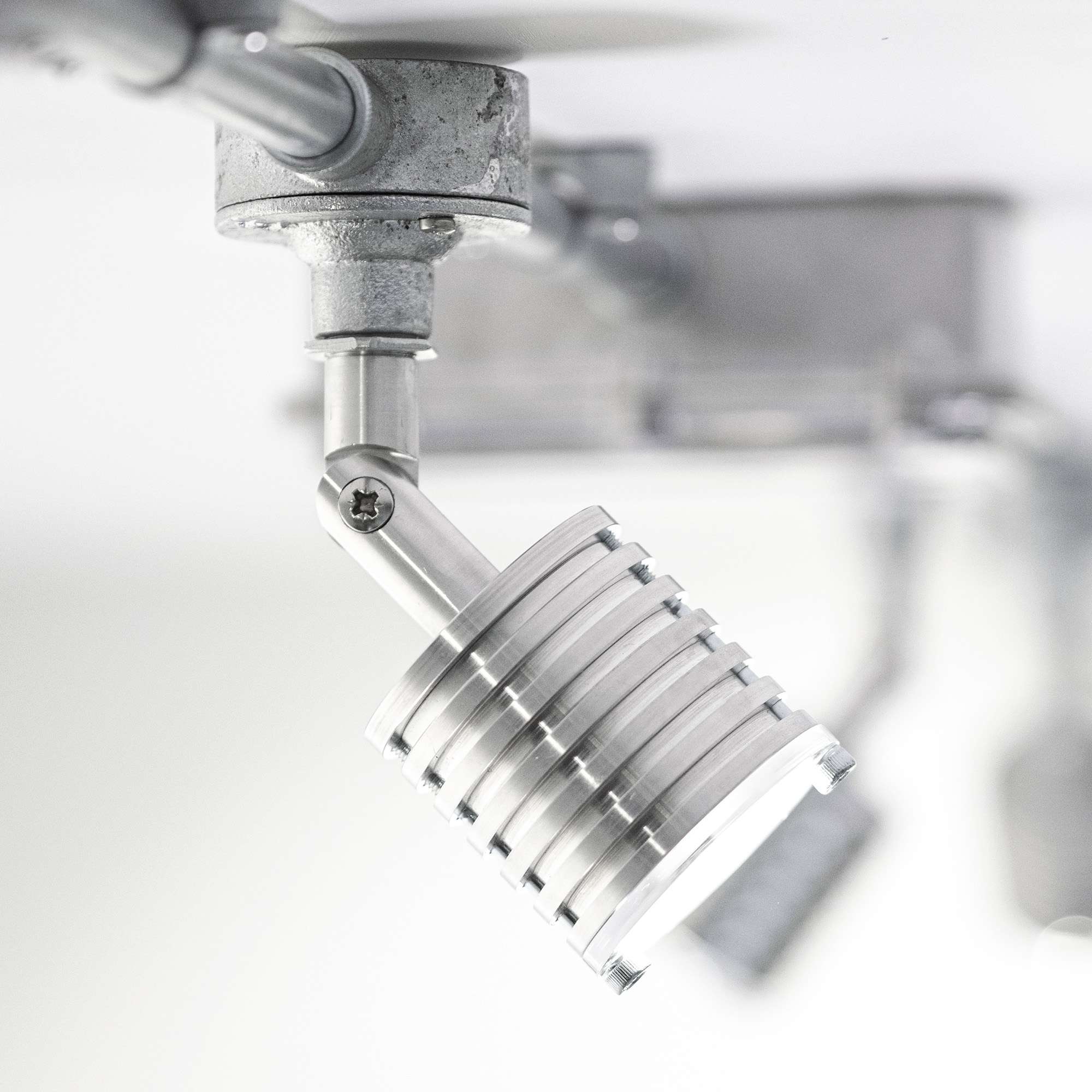 Flat Top 70 as part of a conduit connected lighting system.